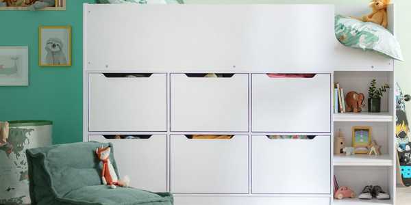 A white coloured midsleeper with storage in a kid's bedroom.